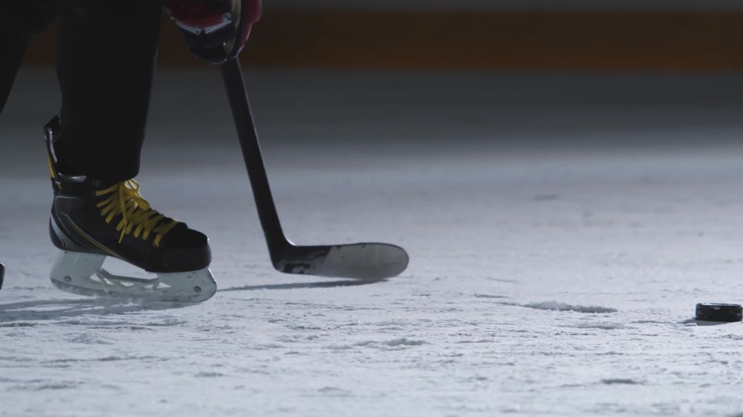 ⁣Slow Motion Hockey Face-Off